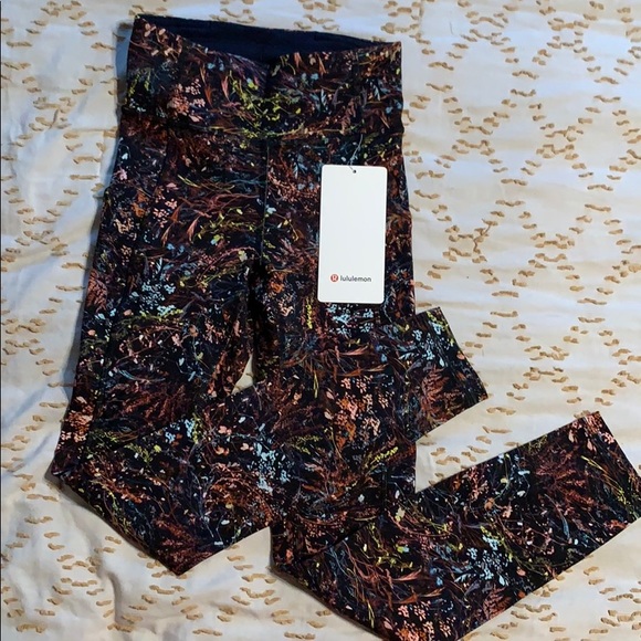 Lululemon Invigorate High Rise Tight 25” w/pockets - Picture 2 of 7